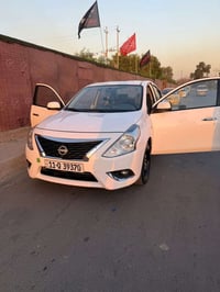 نيسان سني هندي  رقم بغداد موديل 2024بليتة ازرق  مكفوله السياره كير مكي...