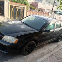 دوج موديل2008 لون اسود قطعتين تفحيل سقف والبوندرقم جديدتدفئة تبريد شاش...
