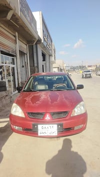 لانسر 2008 • اوتوماتيك • بطاقة بنزين