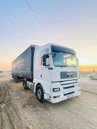 مان موديل 2004 جادر مسرحي مكينه 410 كير اوتماتيك  رقم جديد بسمي جاهزه....