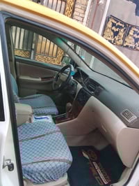 سياره كورولا بيكاجو موديل ٢٠٠٦ اصفر رقم انكليزي بصره بأسمي المكان بغدا...