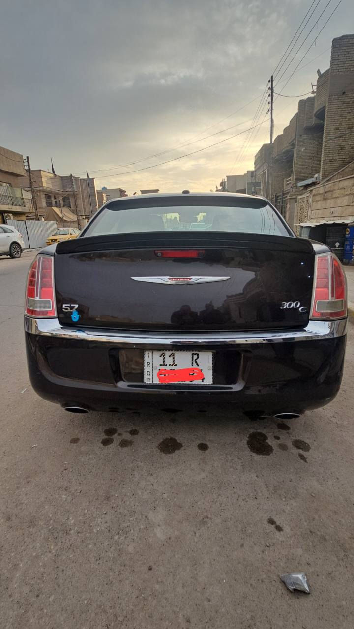 اوباما 300C موديل 2013 محرك 5700 RT  تو ويل وارد كندي فقط جاملغ الاناني الايسر مصبوغ بدون حادث محرك وكير وصدر  باتري تايرات جديد تبريد قطعتين اماني خلفي ثلاجة بردة خلفية كهرباء ومري قلاب كشنات تدفئه رقم بغداد بأسمي السعر ١٦٥ وبيها مجال بسيط 
*********** بغداد, العراق
