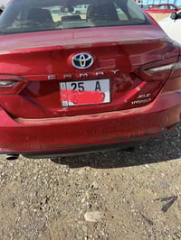 كامري 24هايبرد مواصفات XLEفول رقم كركوك ماشيه 15الف  صور الضرر بلمنشور...