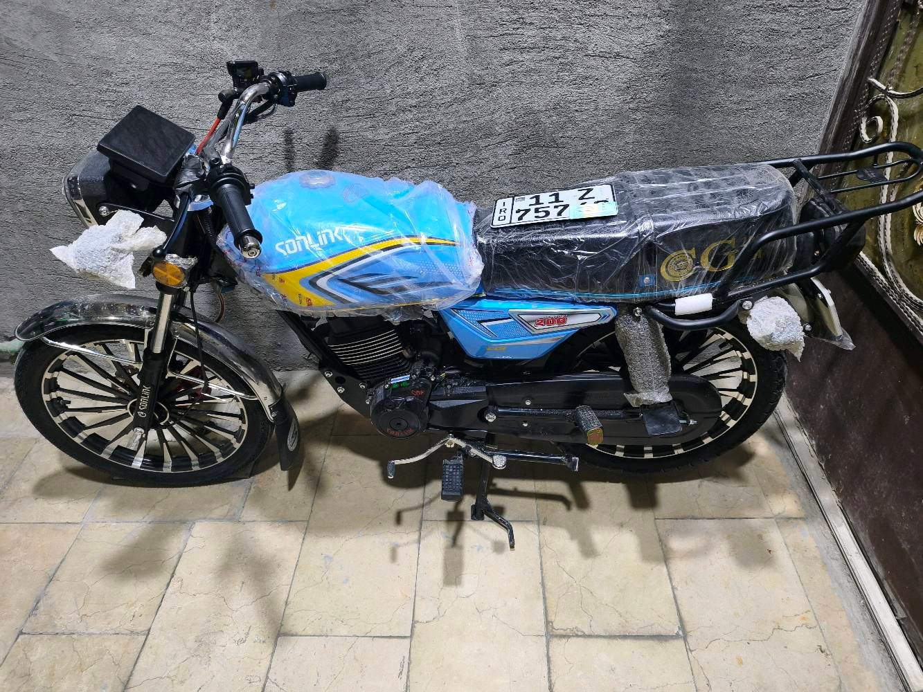 دراجه سونيك رقم بغداد انجليزي مكينه سي بي اف حجم 200 سي سي موديل 2025 العنوان بغداد الجديدة 