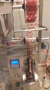 ماكنة تكيس • تعبئة سوائل • معدات تعبئة