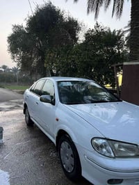 سني ياباني 2001كير عادي محرك اسود 1600 بغداد دولي بسمي  المكان التاجي ...