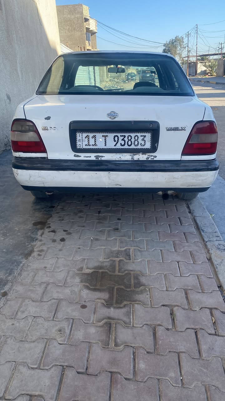 السلام عليكم نيسان سني مديل ١٩٩١سياره جاهزا محرك حاويه جديدكير نظيف تخم تاير كهربايتها كلها جاهزه صدر جديدرقم بغداد نكليزي تحويل مباشر شرط 
سياره حلوه بيها خياسات بسيطه بل هلال خلفي من جوه بسيط مثل ماموظح بل صوره دواخلها نظيفه 
السعر ٣٣وبيها مجال بسيط العنوان ابو غريب 
رقم الهاتف ***********
