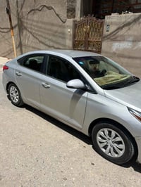 اكسنت موديل19. سياره ماشيه77. الف. رقم بغداد بسمي. تبريد شغال مكينه كي...
