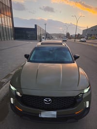 Mazda cx50  preferred plus کوشن ساردو گەرم پێشەوەو دواوە کوشن خەزن دات...