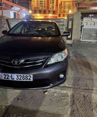 كورلا 2013 خليجي لون رصاصي   رقم اربيل  محرك 1600 حساسات  شاشه  كامرة ...