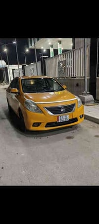 نيسان فيرسا موديل 2014 حادث جاملغ وبنيد صبغه جديده مواصفات عاديه السعر...