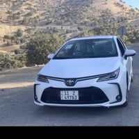 للبيع كورلا هايبرد 2025  رقم بغداد ماشيه ١١ الف كيلو متر  قابل للزياده...