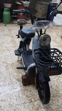 دراجة كهربائية • حجم ١٤ • ٤ بطاريات