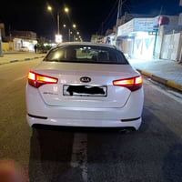 اوبتيما 2014كير ومحرك مكفول مري شفط 139 وبيه مجال  الاسفسار 0777949131...