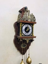 ساعة أطلس • برونز أصلي • آلية أوزان