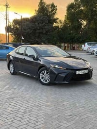 🚗 كامري هايبرد 2025 للبيع — وارد أمريكي / رقم بغداد باسمي  • الموديل: ...