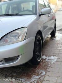 لانسر • ٢٠١٠ • رقم كربلاء