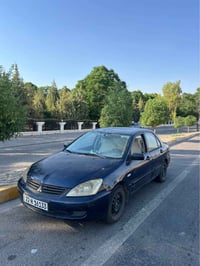 ميتسوبيشي لانسر • مكينة قوية • أربيل