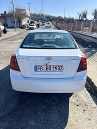 أوبترا ٢٠١٢ • اوتوماتيك • بويا ٢ پارچه