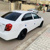 اوبتره 2011  رقم ذيقار بسمي لوحات انكليزي  كير مكينه تبريد سياره جاهزه...