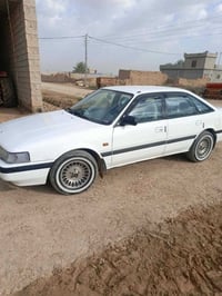 مازدا موديل 91 گير ئوتماتيك محرك 8 و بخ رقم سنوية جديد گير محرك بشرط ك...