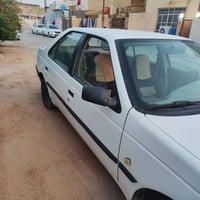 بيجو 405 مديل 2009  سيارة معمرة  مصبوغة جمالية  خياسات مابيها  رقم نجف...