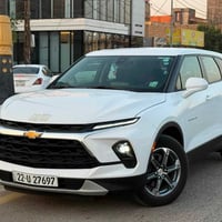 شوفرليت بليزر 2025 ابيض 2LT رقم اربيل  ضرر خلفي قليل جدا جاملغ خلفي وط...