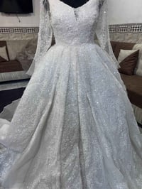 بدله • ملبوسه • توصيل