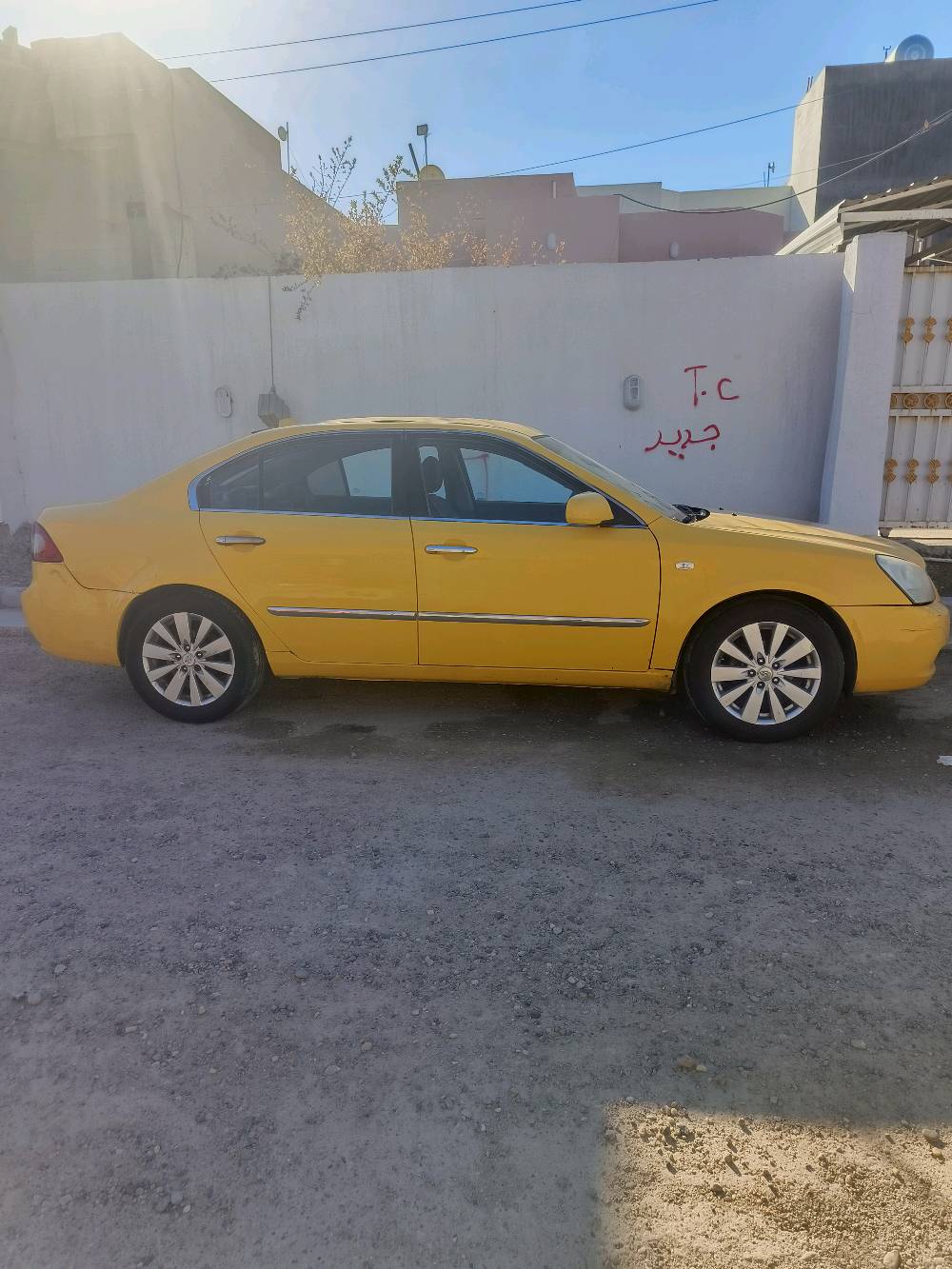 الرمادي الزراعه قرب شارع 60علما ان السياره مشفيه على صفحه السائق بس ماكينه وجير سليمات حداديه سليمه