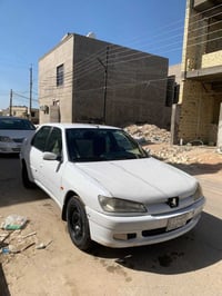 وبركاته  بيجو 306 للبيع 2001 بيها صبغ جاملغ امامي و باب خلفي عكس الساي...