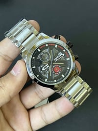 ساعة أصلية • وكالة • توصيل