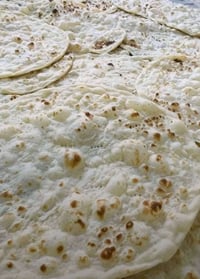 خبز أبيض • خبز أسمر • توصيل طوز خورماتو