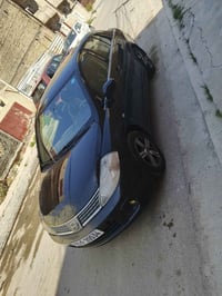 نيسان فيرسه 2009 باسمي سنويه لل2031  كير اي تي مكينه 1800خير من الله  ...