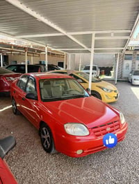 سيارة للبيع هونداي اكسنت موديل 2004 رقم بابل تبريد شغال  تخم تاير جديد...