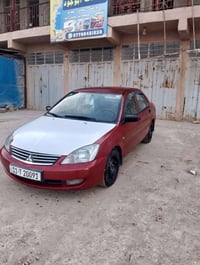 سياره لانسر موديل ٢٠١٠ رقم بغداد بسمي مكفوله كفاله عامه عده رش جامرلغ ...