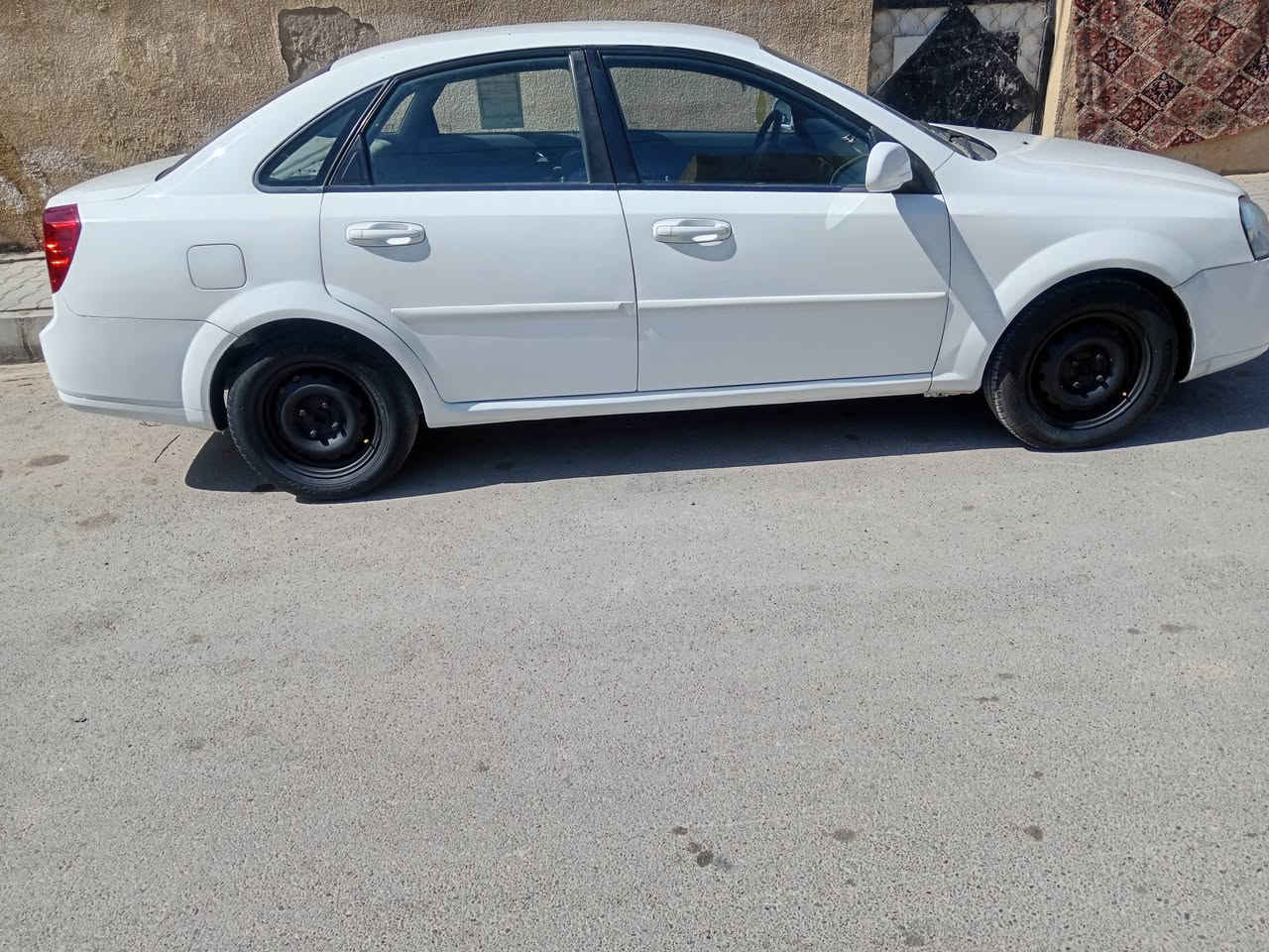 وبترا موديل 2011 بيهه صبغ الجهتين مكينه كير تبريد حداديه كلهه جاهزه سعر 70 وبيهه مجال  مكان كوت ***********
