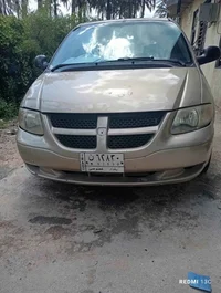 دوج كرفان 2004 شاصي طويل رقم بغداد ألماني سياره جاهزه كير مكينه حداديه...