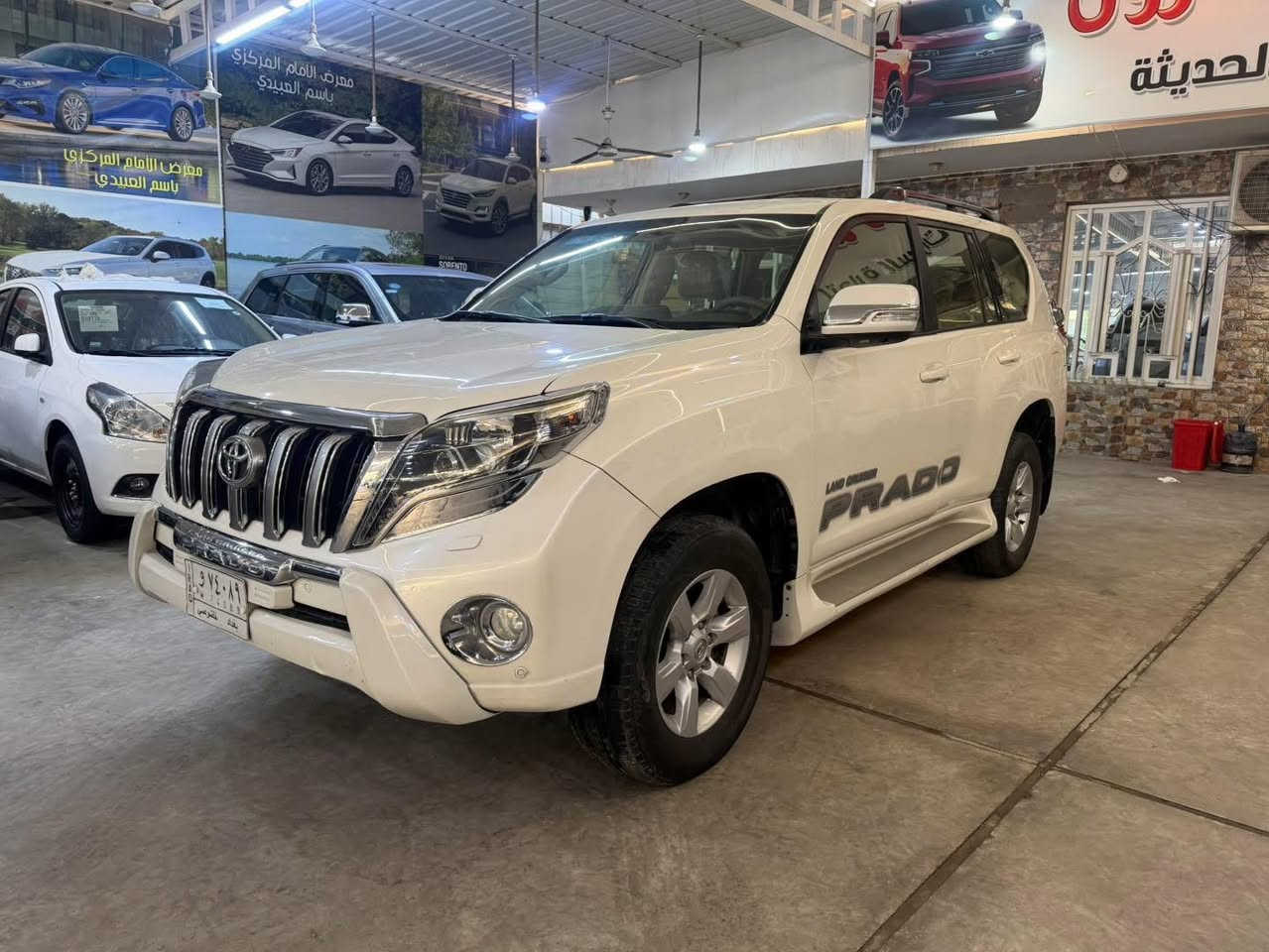 🔷 معرض الإمام المركزي 🔷
📍 العنوان: بغداد – الكريعات – شارع الوقف السني

⸻

🚘 تويوتا برادو 2014 VX
🔹 فول مواصفات – رقم بغداد

المواصفات:
 • بصمة فتح وتشغيل
 • مقاعد جلد
 • كراسي كهرباء
 • تبريد كراسي (أمامية + خلفية)
 • لايت زينون
 • زراك لايت
 • ستيرن كهرباء
 • 6 سلندر
 • محرك 4000
 • 7 ركاب
 • 3 قطع
 • عداد المسافة: 114,000 كم

الحالة:
 • السيارة بيها شخوط خفيفة (غير قوية) جهة عكس السائق
 • بارد بمقدار إصبعين بالبلب، والباقي مكفول

⸻

💰 السعر:315$
✔️ مجال بسيط

⸻

📞 للاستفسار:
***********
***********
