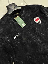 بدي مغسول • تطريز شعار • مقاسات S-XXL