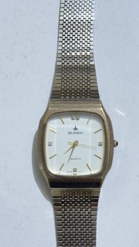 ساعة سويسرية • بورين • كوارتز