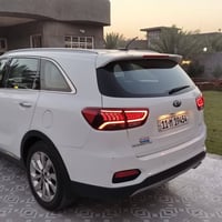 سورنتو 18 شكل 20 رقم بغداد بسمي  السعر ٢٥٠ماشيه ٩٧ بيه شخط بين البابين...