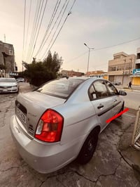 اكسنت ٢٠٠٩ • ١٦٠٠ • رقم بغداد