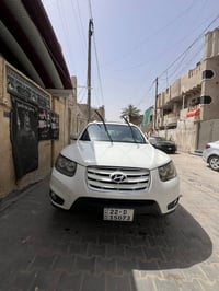 سنتافيا 2009 رقم أربيل وباسمي   ٧راكب ٣قطع تبريد  لون ابيض  محرك ٢٧٠٠ ...