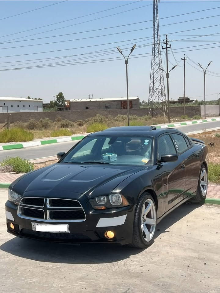 مرحبا دوج تشارجر للبيع RT MAX هيمي أعلى مواصفات فتحه و رادارات و خزن ميموري تبريد كشانه و تدفئه و كلاصات كذلك وستيرن 
بدون كصه تبريد وجاهز للأخير بيها ارقام وسنويه مرتبات ومطابقات مكان السياره ديالى السعر ٧٠ و السياره نضيفه كلش ومابيها نقص 
***********
