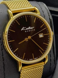 ساعة KOLBER سويسري أصلي بطارية  مكينة روندا ١حجر  نافذة للعرض التاريخ ...