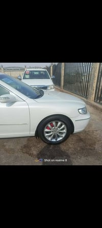 ازيرا 2008 مكفوله كفاله عامه محرك 3800 رقم بغداد الدولي السعر 128 وبيه...