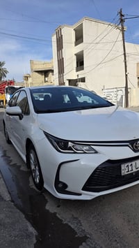 كورولا 2025 الشكل الخليجي رقم بغداد فول مواصفات داخل احمر  والجام ايضا...