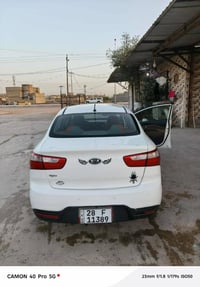 كيا ريو • ٢٠١٣ • بأسم راعيها