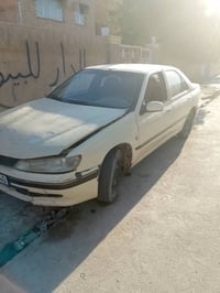 بيجو فرنسي موديل 2001غيي متواجد على الفيس07700310357