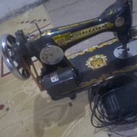 مكينة خياطة • بها مجال